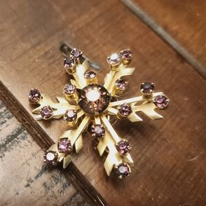 Elegant Gold Colored Metal and Purple Rindstone 1950's Snowflake Brooch. 1.5 In